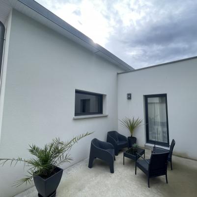 Construction maison neuve plain pied Liffré - Extérieur salon de jardin